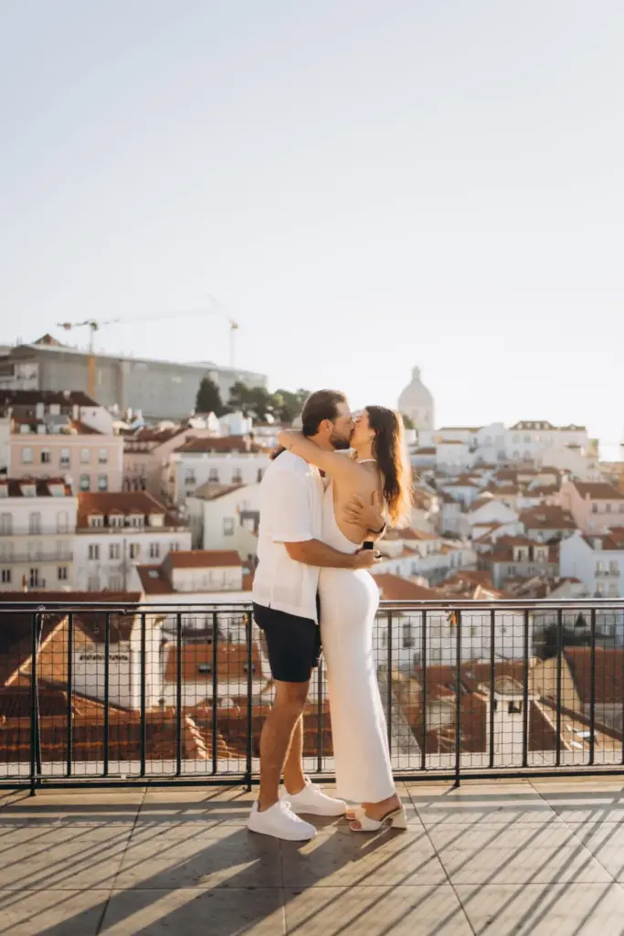 Couple hugging right after the proposal at the viewpoint