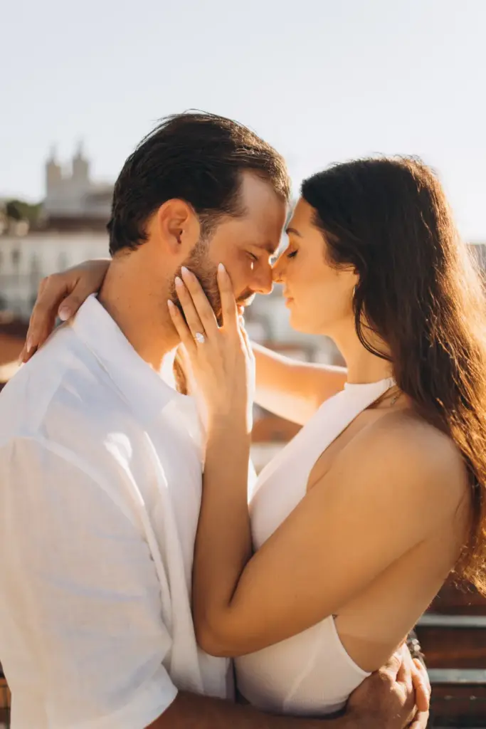 Couple kissing after the proposal