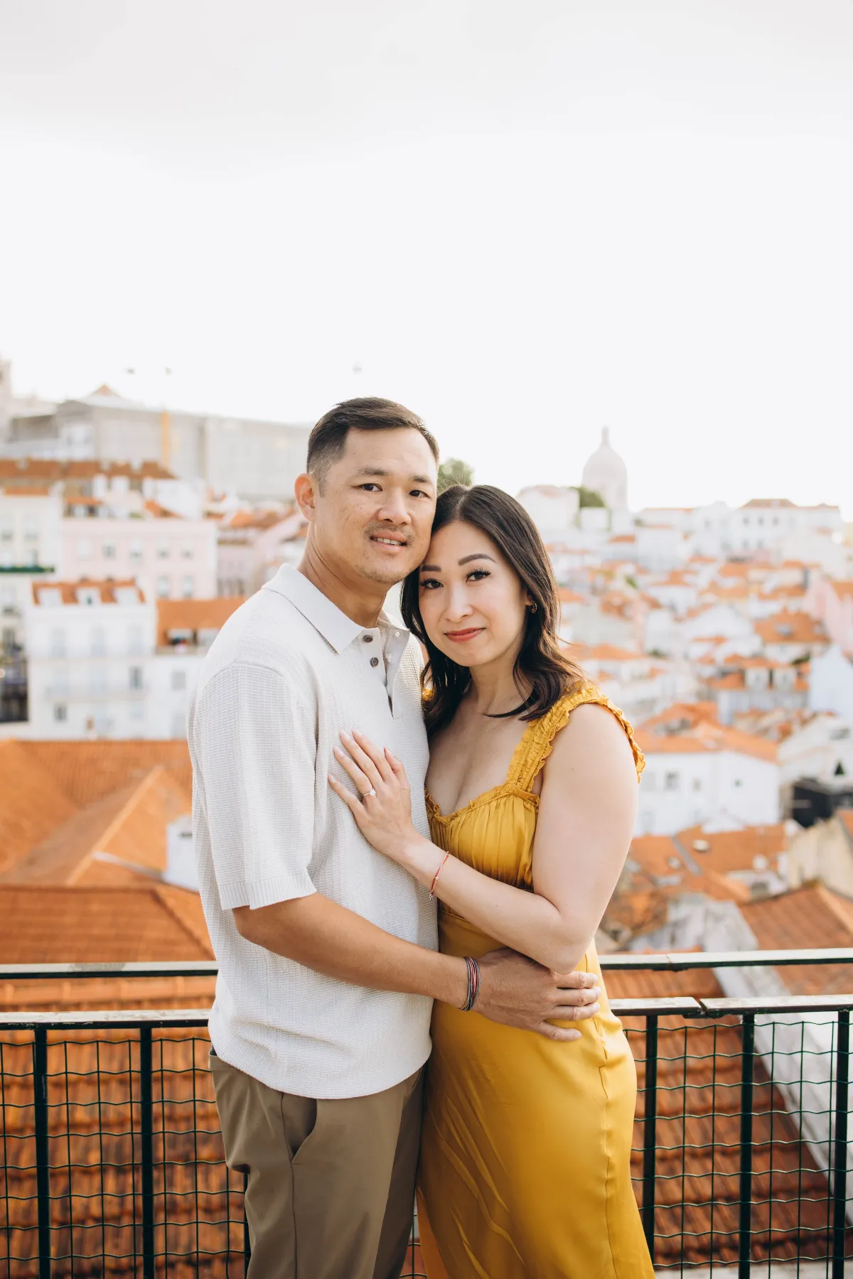 Couple photoshoot from the Alfama viewpoints to the river