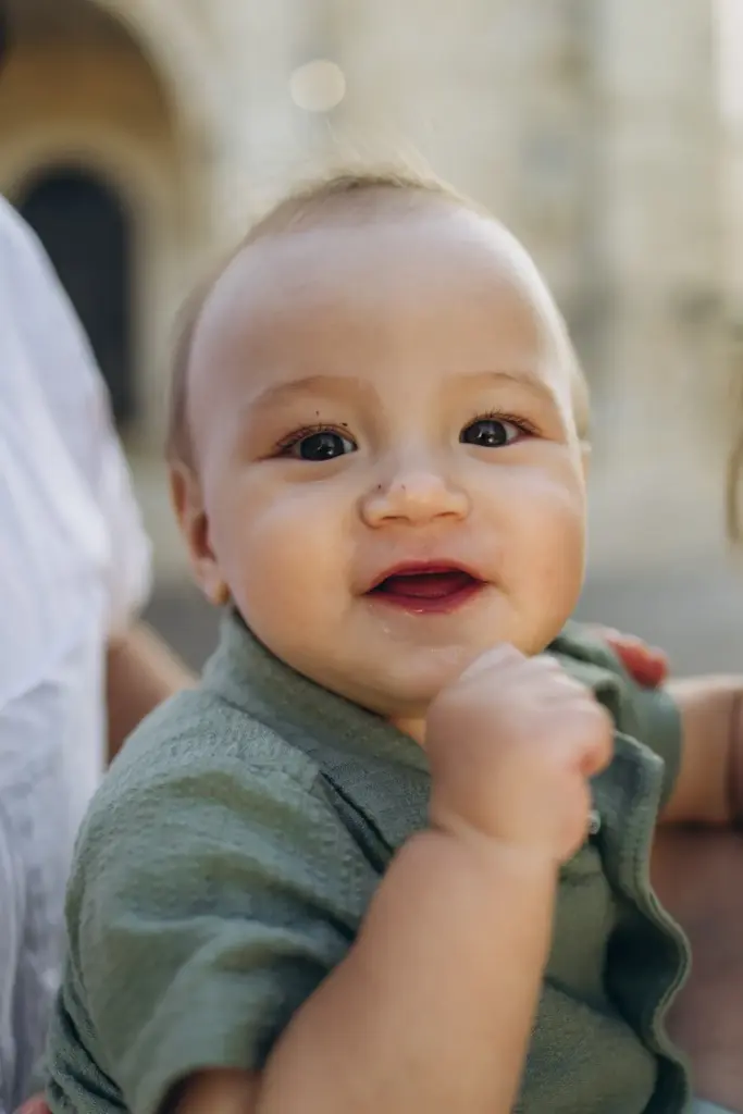 Close portrait of a smiling baby in Lisbon