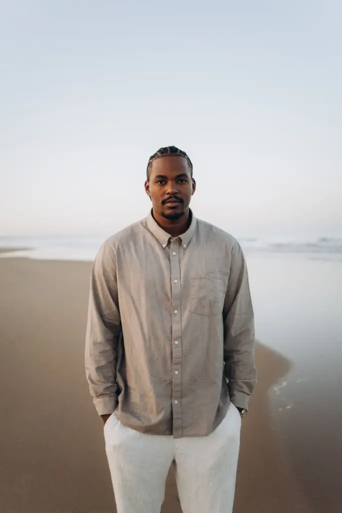 Portrait of a father-to-be on the beach near Lisbon