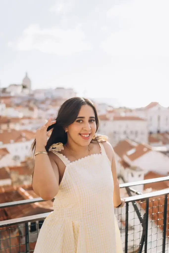 Woman at a Lisbon viewpoint in the morning