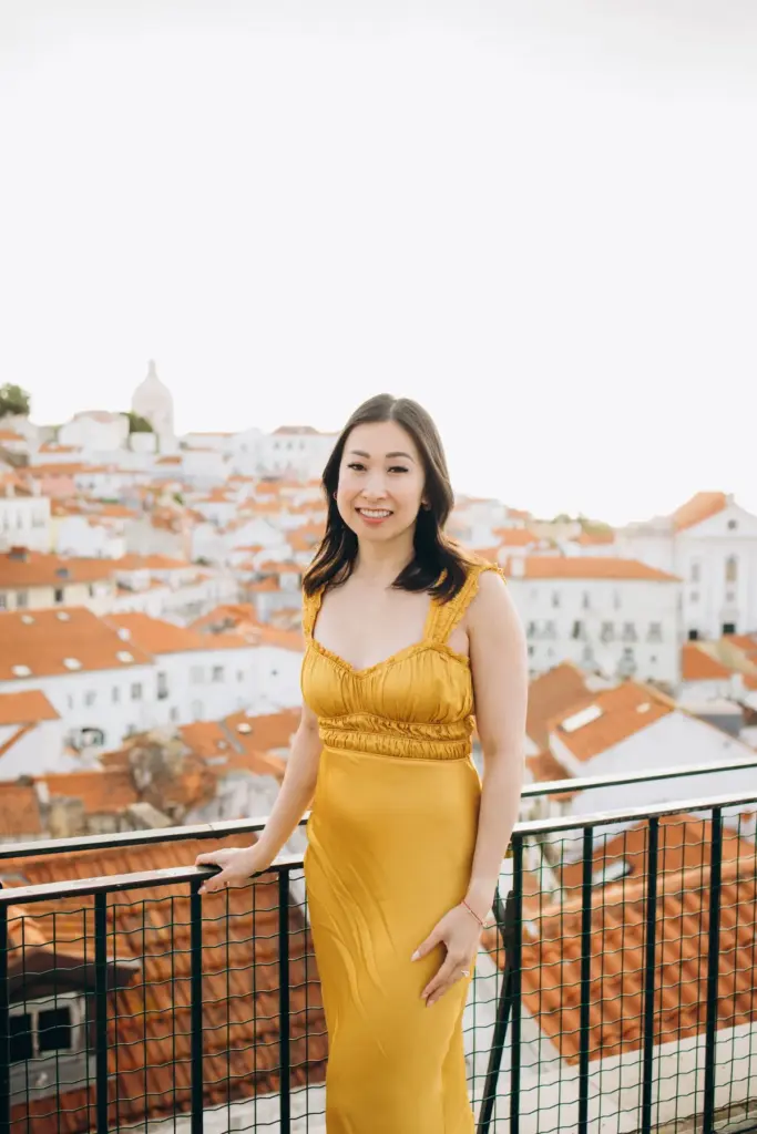 Portrait of a woman at the Portas do Sol viewpoint over Alfama