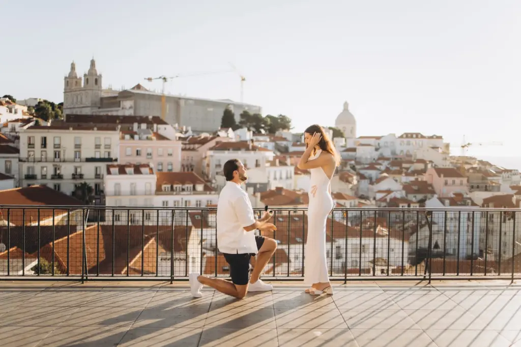 Proposal on one knee at an Alfama viewpoint above the rooftops